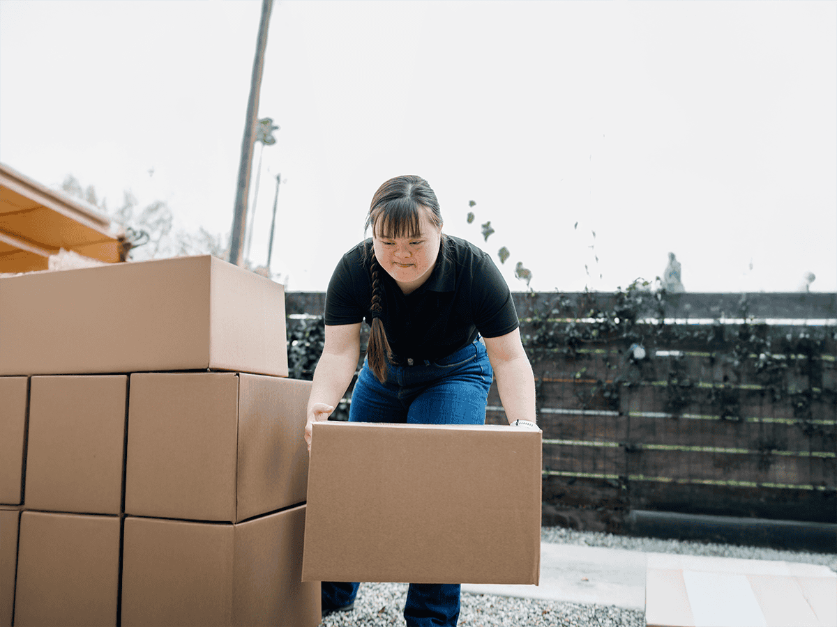Delivery Person Getting Parcel Out Delivery